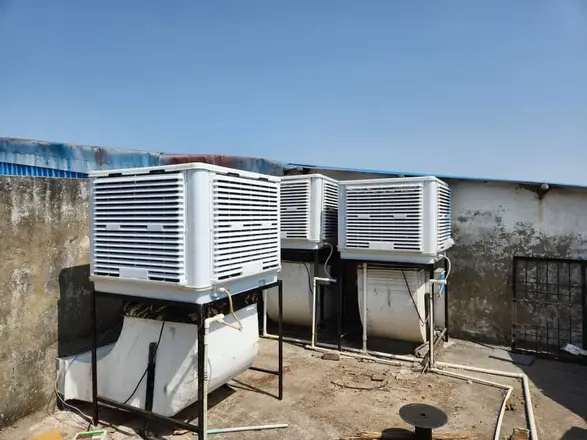 Rooftop coolers with duct connections