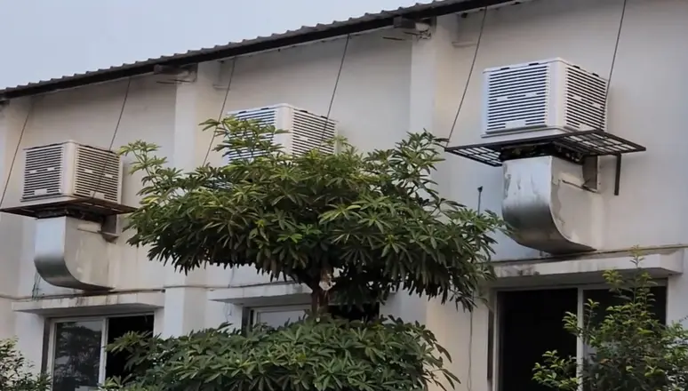 Wall-mounted coolers with ducting