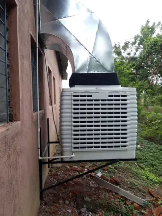 Wall-mounted cooler with ducting
